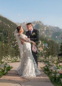 Choosing your perfect Portland wedding photographer - Bride and groom with flowers